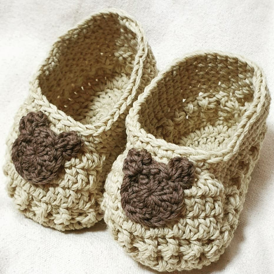 baby shoes. made by LaPace wool yarn, brown. mustard