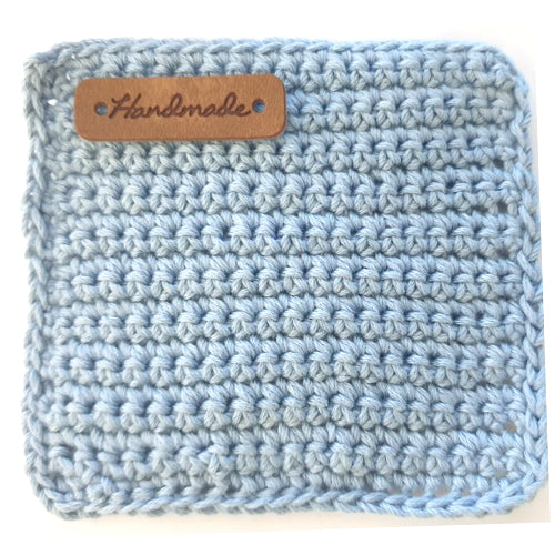 square tea coaster - made by LaPace organic cotton yarn. blue