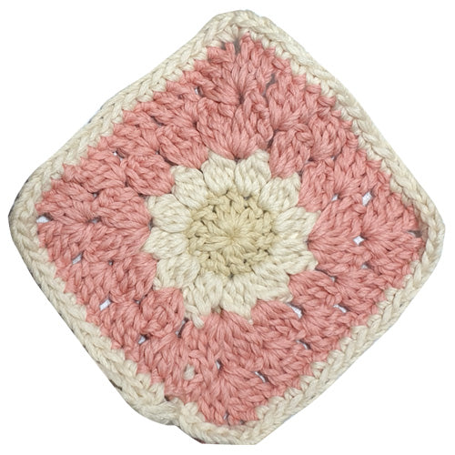 tea coaster. ivory pink color. LaPace fine merino wool yarn